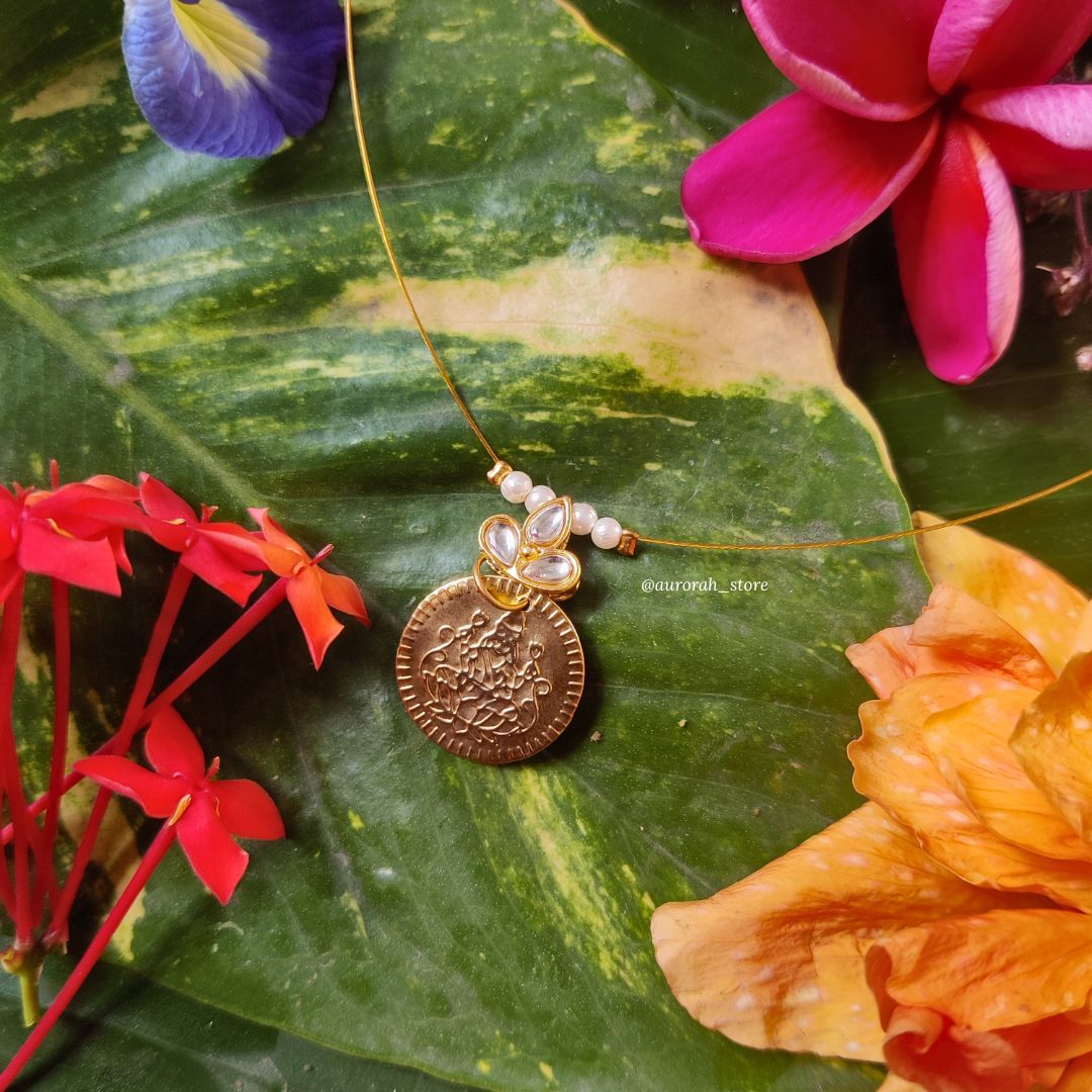 Antara - Lakshmi coin with white flower Invisible Jewelry AS025